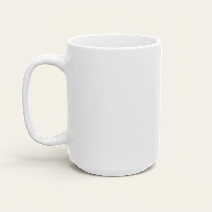 A plain white ceramic coffee mug with a C-shaped handle, shown from a three-quarter angle against a solid, light cream-colored background.