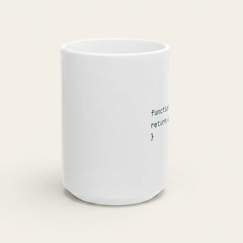 A white ceramic mug with black printed code text reading 'function return {}' on a light cream background.