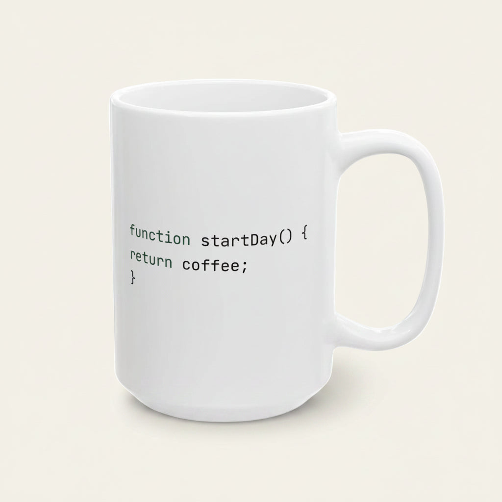 A white ceramic mug with a black printed code snippet that reads 'function startDay() { return coffee; }' on a clean white background.